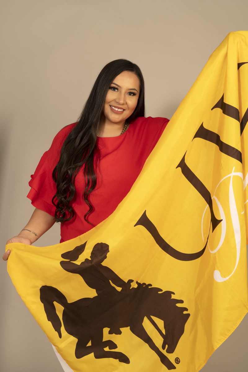 mia holt with uw flag