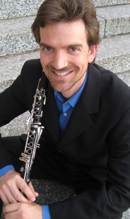 Gregory Oakes holding clarinet