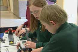 Children programming robots
