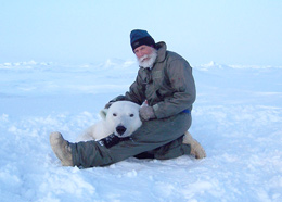 Man holding polar bear