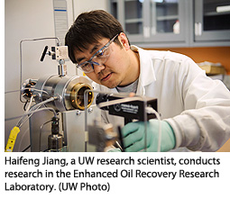 Haifeng Jiang, a UW research scientist, conducts research in the Enhanced Oil Recovery Research Laboratory.