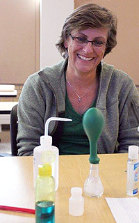 Woman conducting science experiment