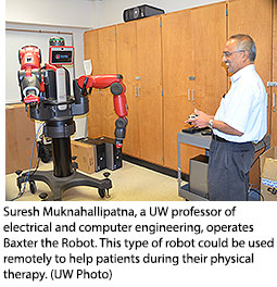 man remotely controling robot