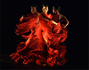 dancer in a swirly red dress