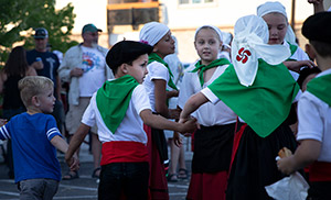children in ethnic clothing dancing
