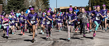 young girls of various ages running