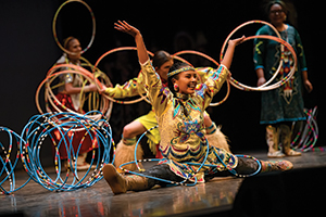 Native American dancers performing hoop dance
