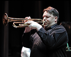 man playing a trumpet