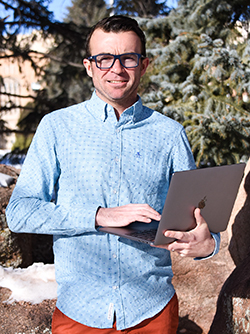 person holding a laptop