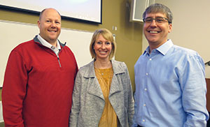 three people standing together