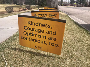 yard sign in UW colors