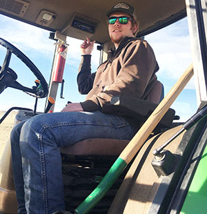 man sitting in a tractor