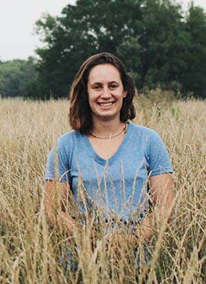 woman standing in a field