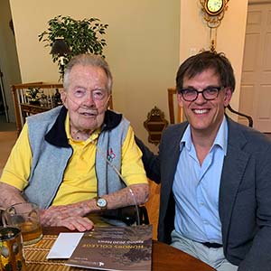 two men posing together