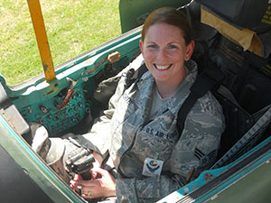 woman in camo fatigues