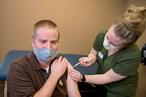 person getting vaccinated