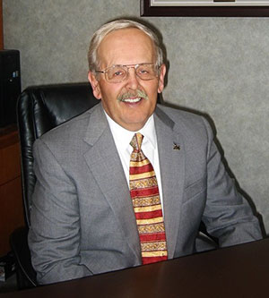 man sitting at a desk