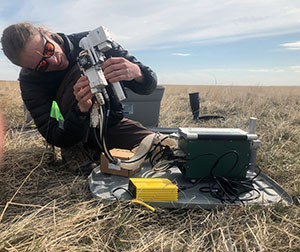 man using equipment outdoors