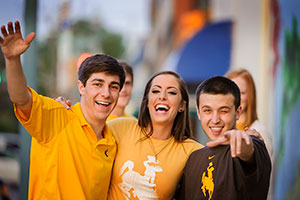 three students standing together