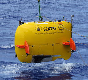 bright yellow box-like underwater vehicle