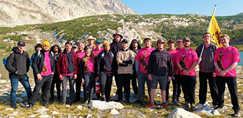 group of people posing outside