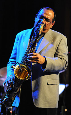 man playing a saxophone