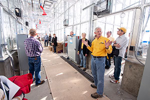 people in a glassed in building area