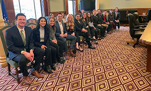 group of people sitting in a row