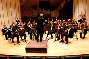 man conducting wind symphony