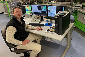 man sitting at table in lab