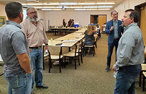 people talking in a meeting room