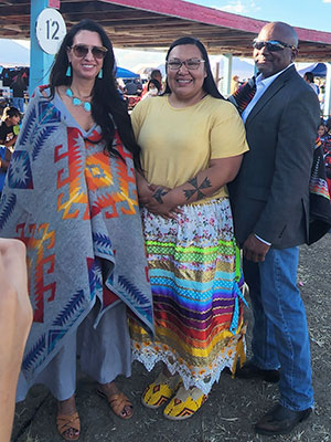 three people standing together