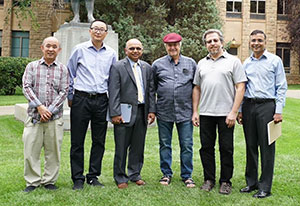 group of people posing outdoors