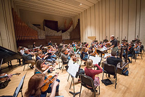 symphony orchestra rehearsing