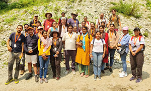 large group of people posing outside