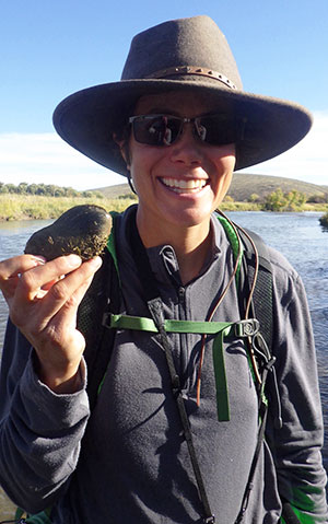 woman holding a mussel