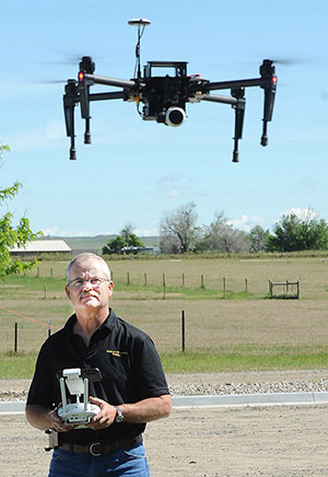 man flying a drone