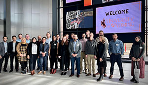 large group of people posing together