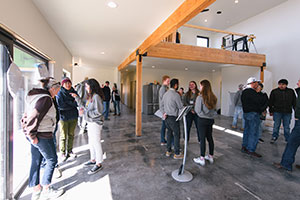 people inside a recently finished house