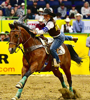 woman dismounting galloping horse