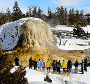 geothermal rock deposit with people looking at it