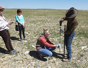 people installing things on the plains