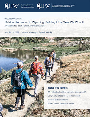 publication cover showing people walking along a trail by water