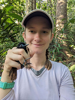 woman holding a bird