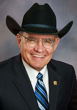 head photo of a man in a cowboy hat