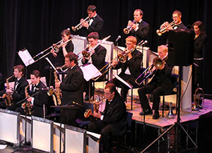 group of brass and wind players performing