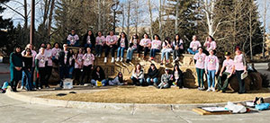 large group of people posing outside