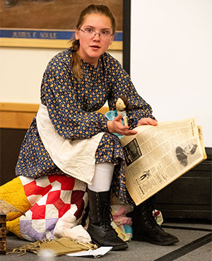 girl dressed in period costume