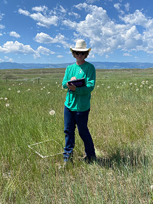 person standing in a field