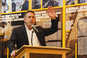 man speaking at a podium